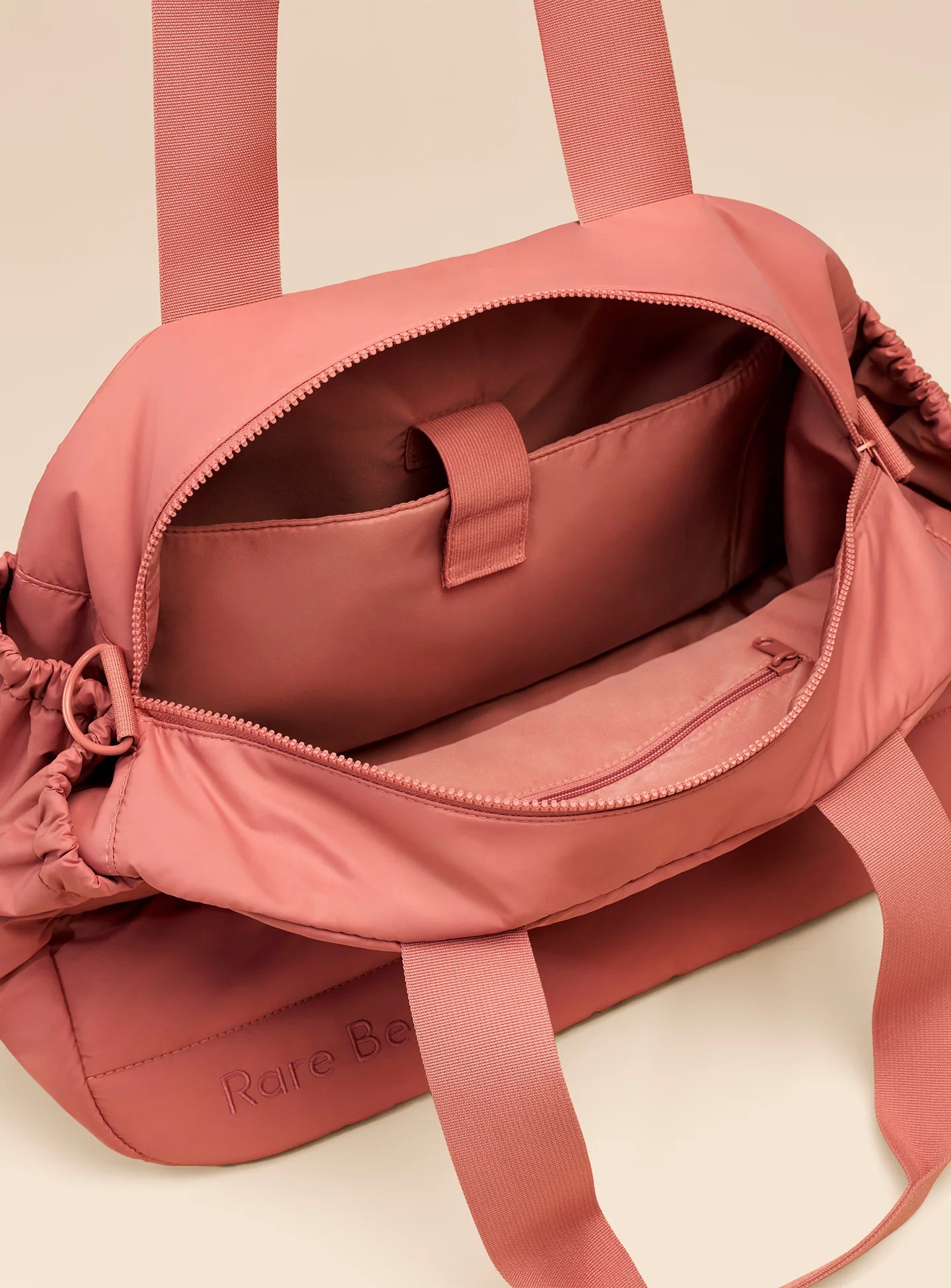 BOLSO DE MANO: PUFFY CARRYAL